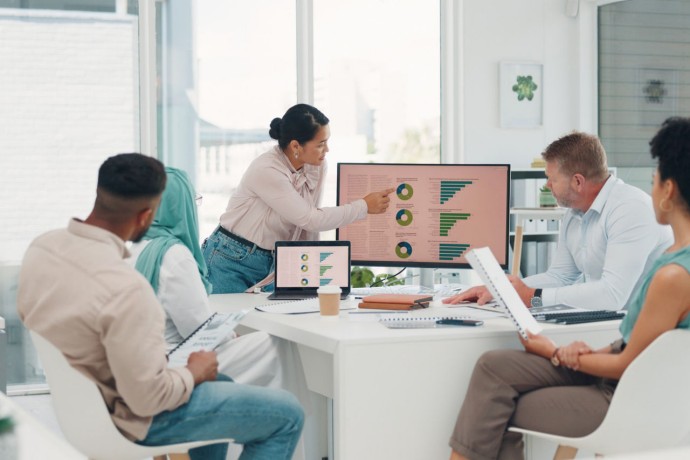 Business people presentation and computer with woman planning or graph for target