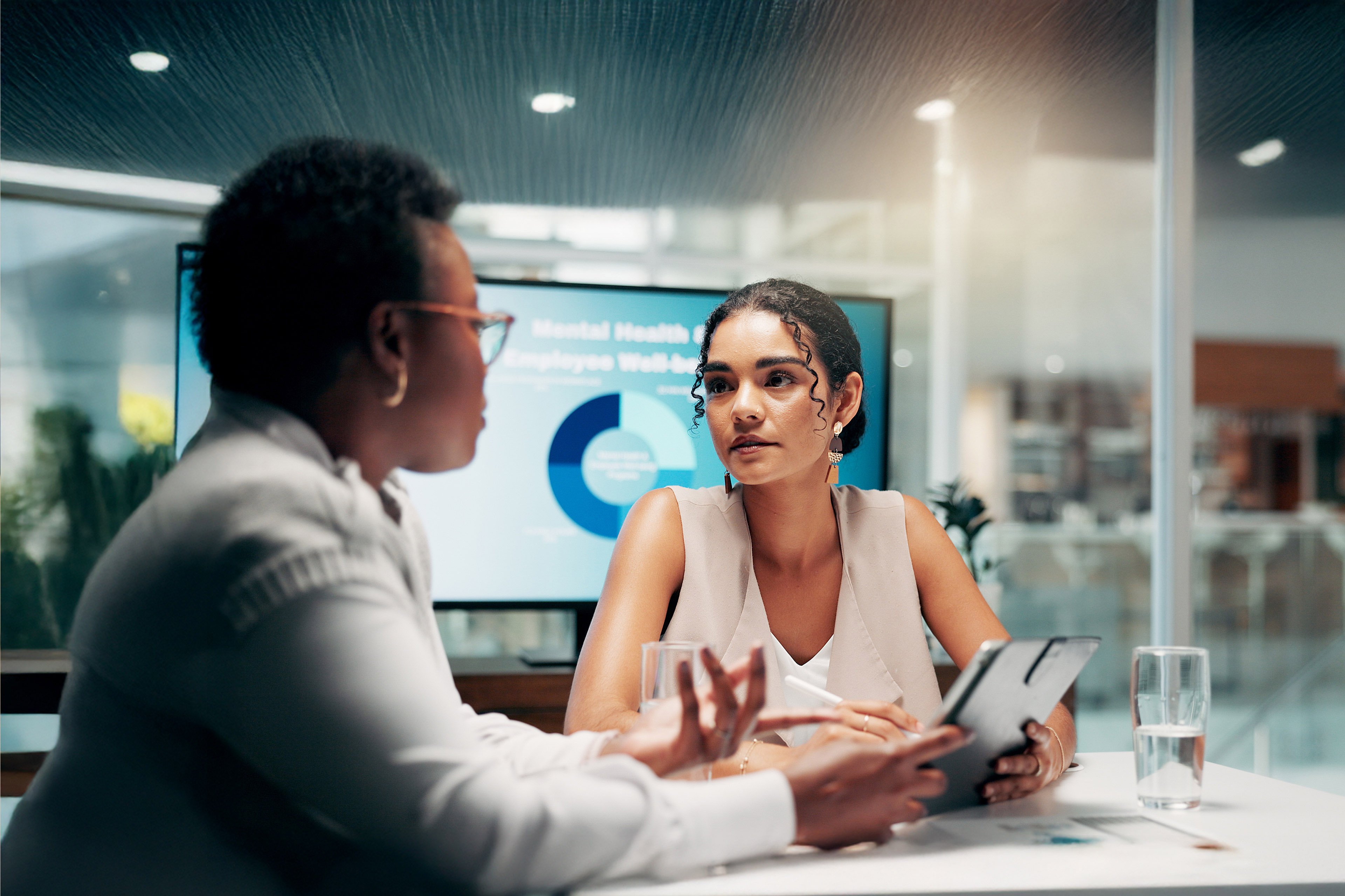 Meeting, discussion and women with tablet