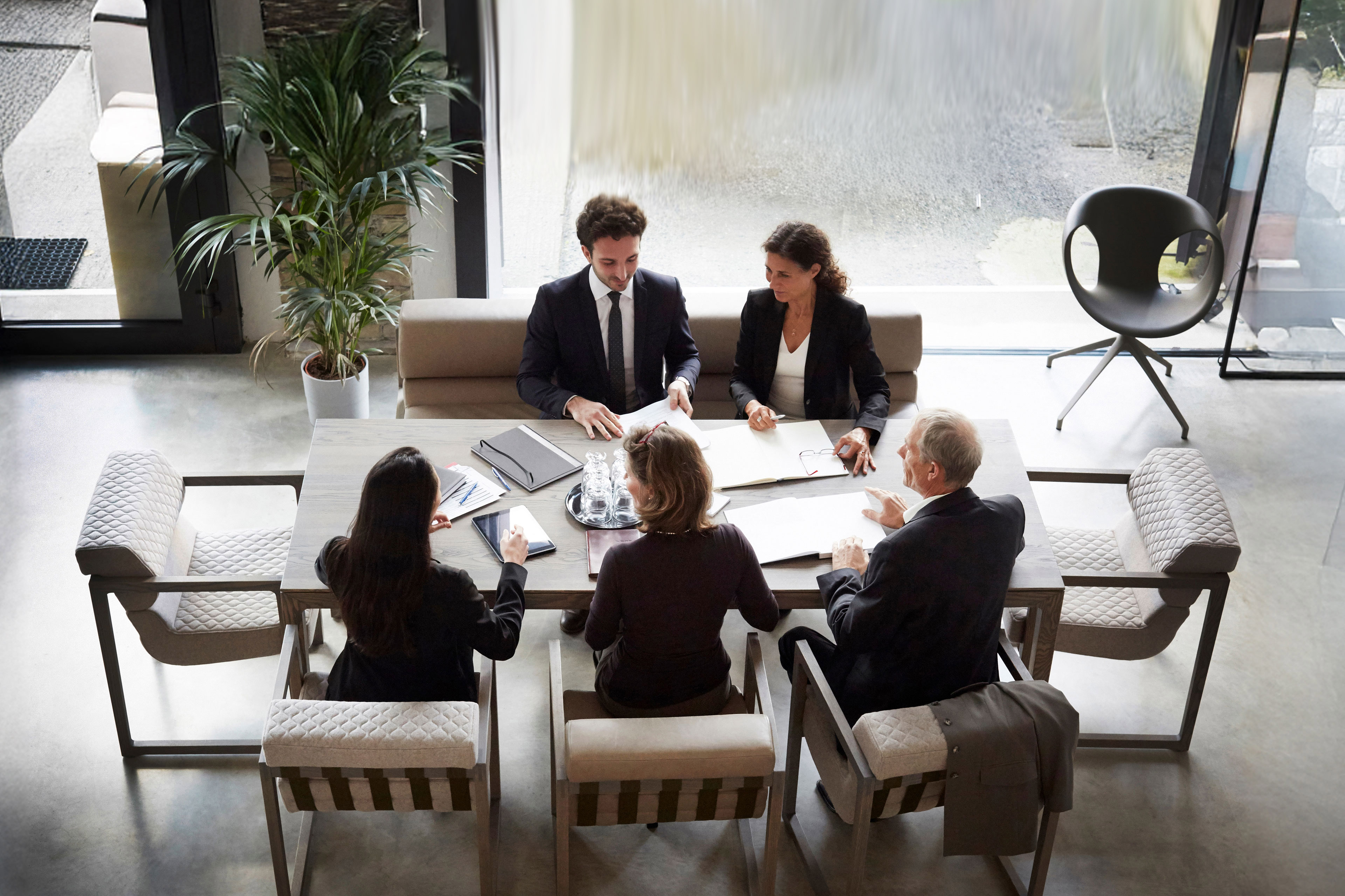 High angle view of financial advisor discussion
