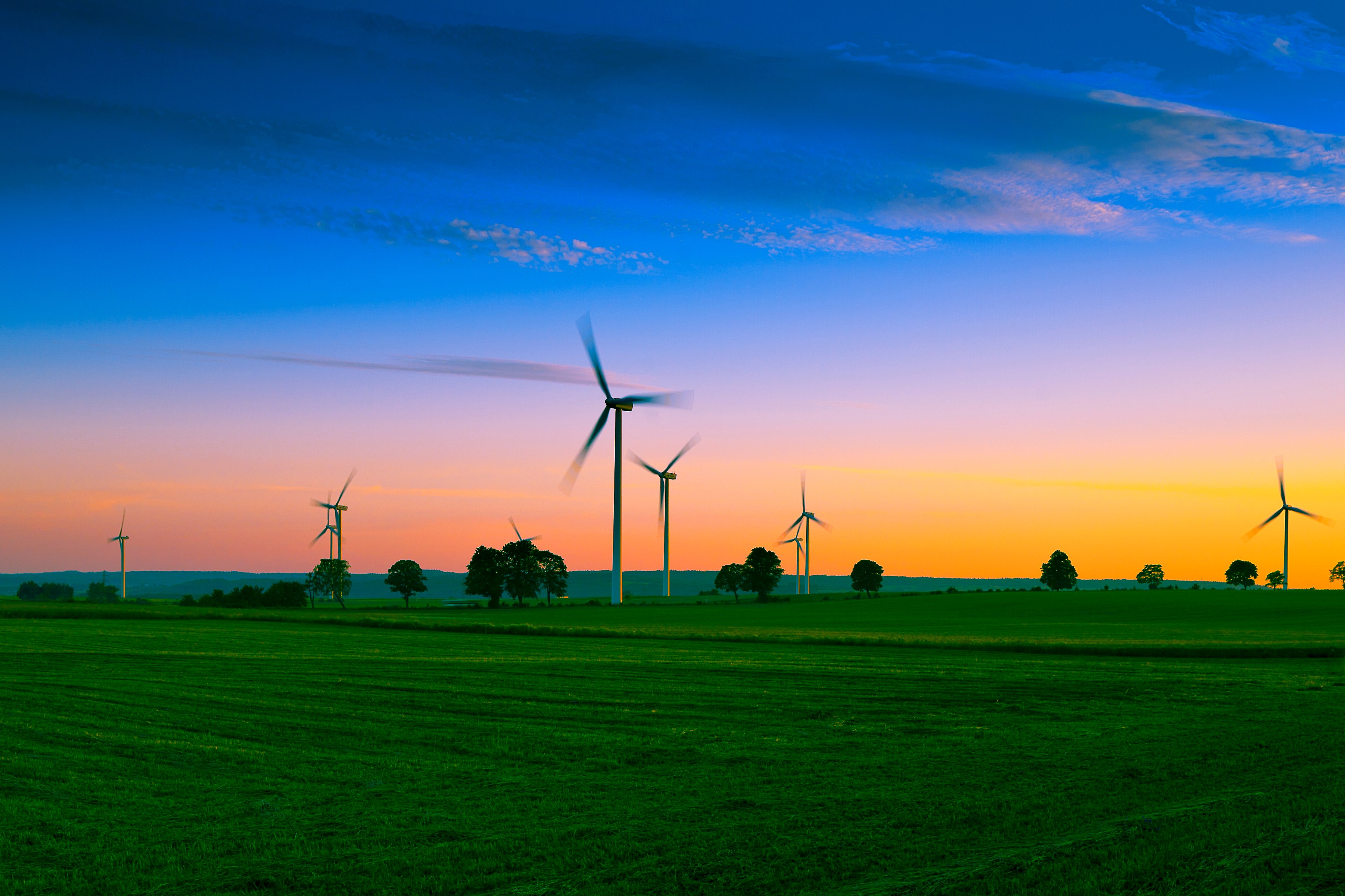 Sunset view of solar wind farm