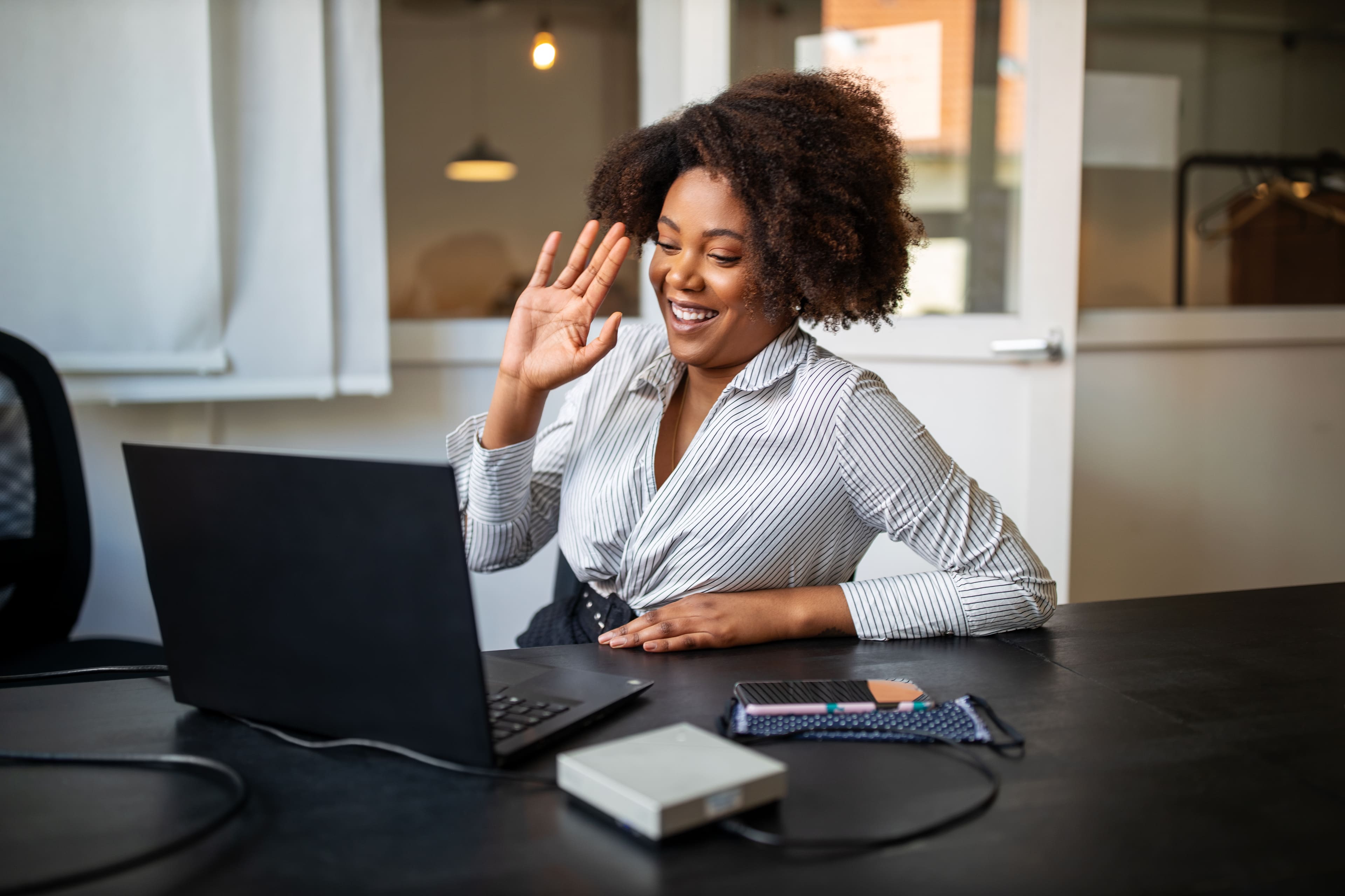 Businesswoman having video call meeting in office