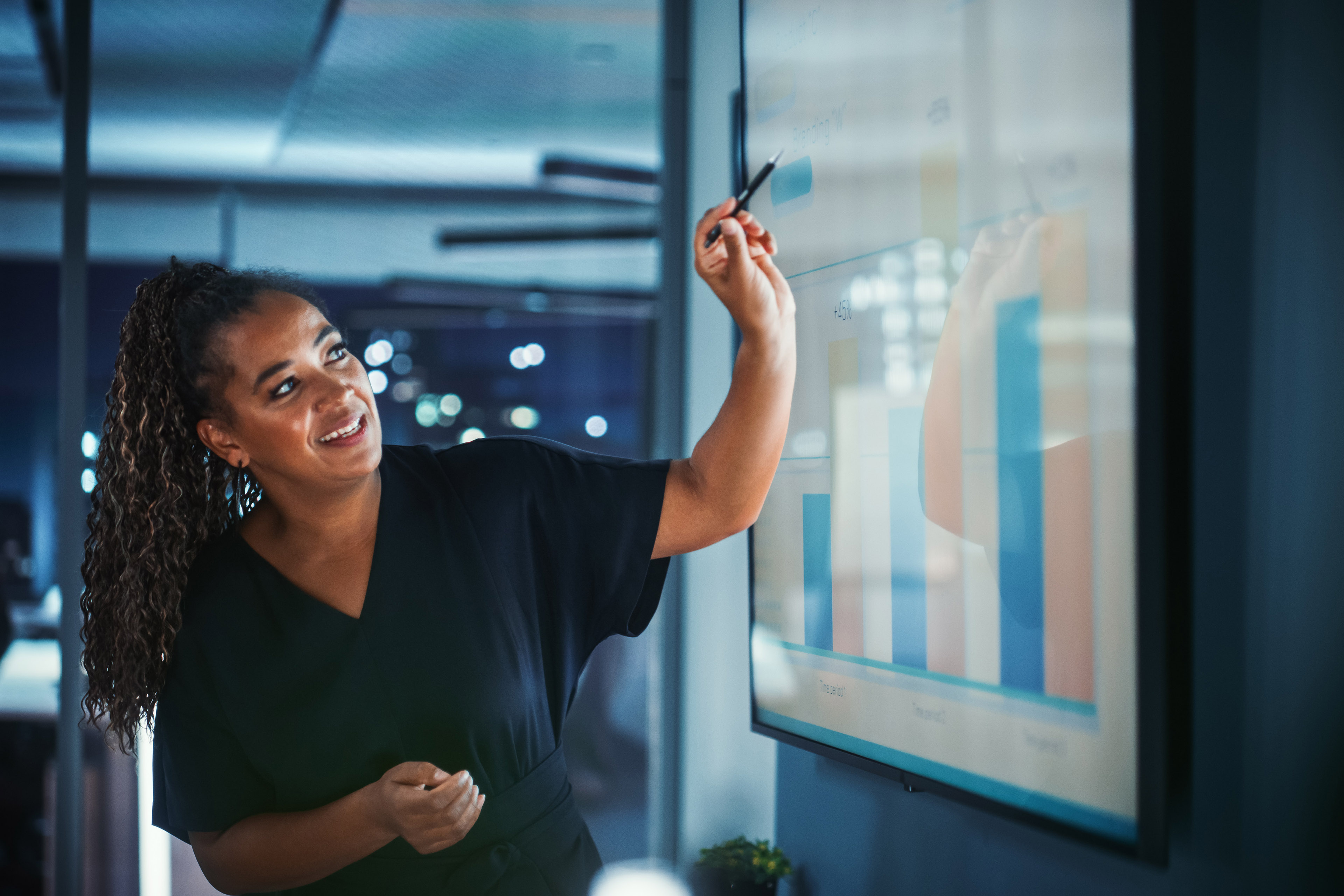 Women showing graphs