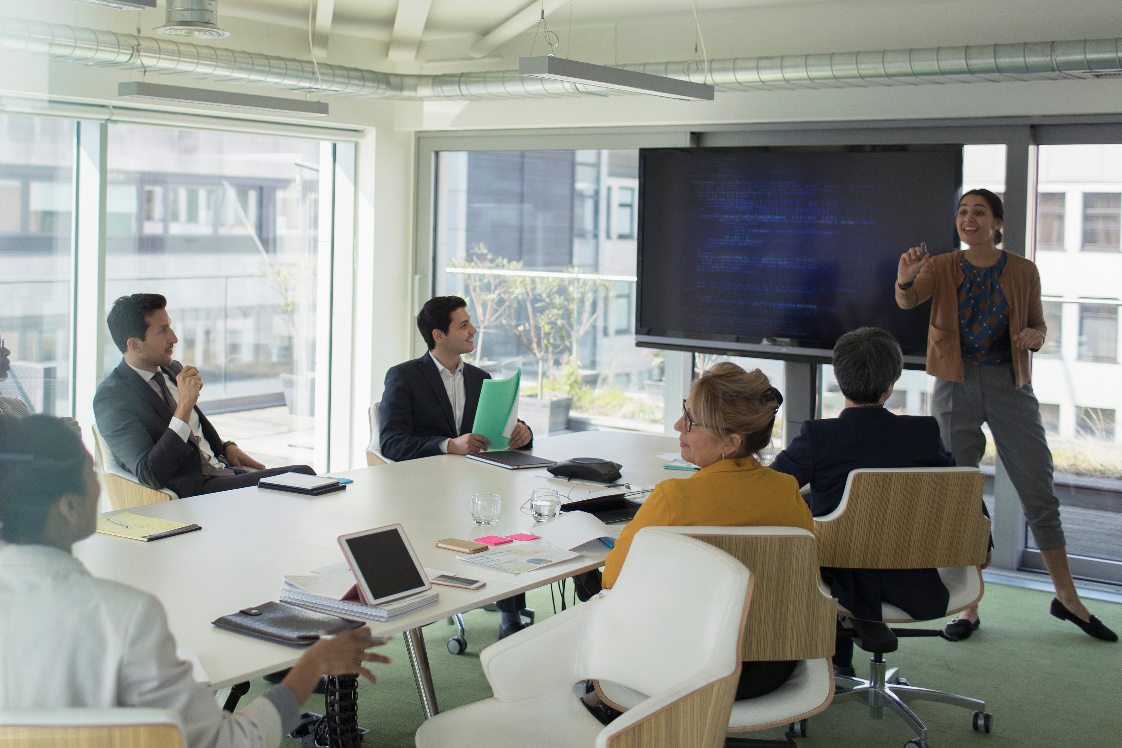 Business woman leading conference