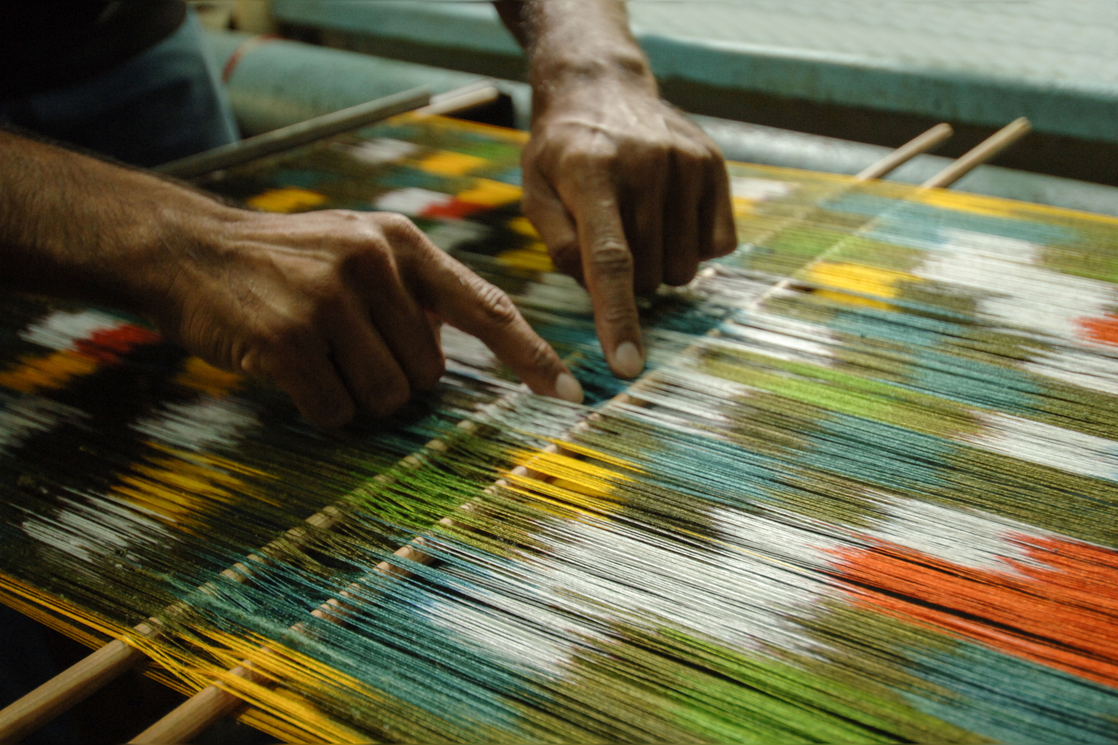 Weaving of carpets and fabrics