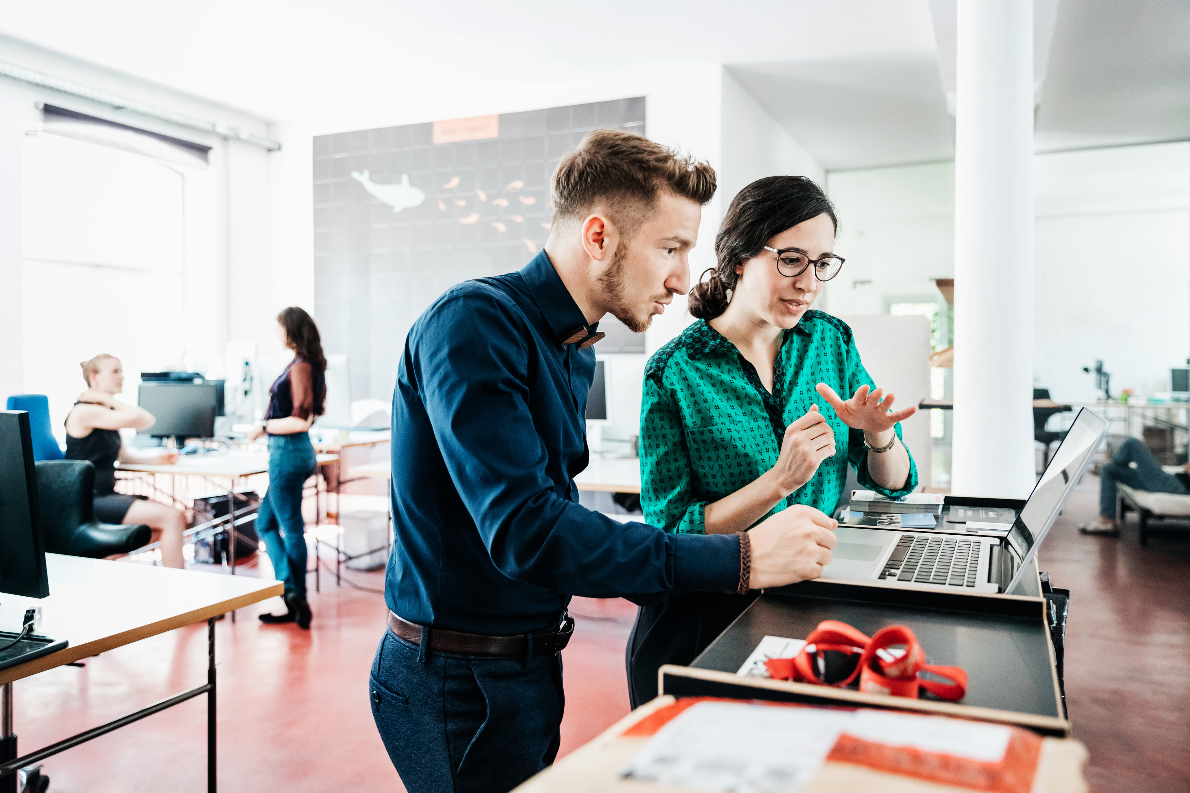 A group of startup business employees working together in office 