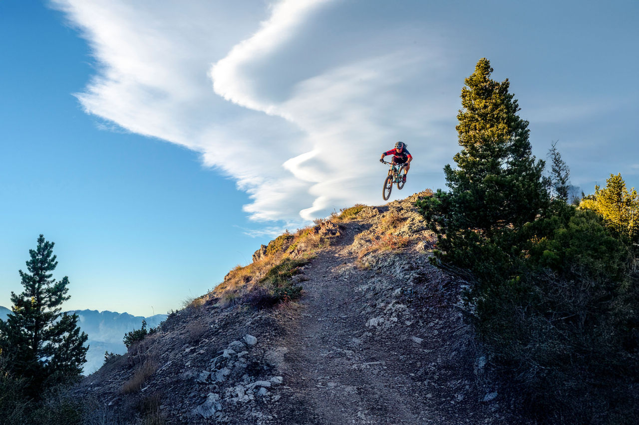 Lofty clouds over Canadian Rocky Mountains in the distance