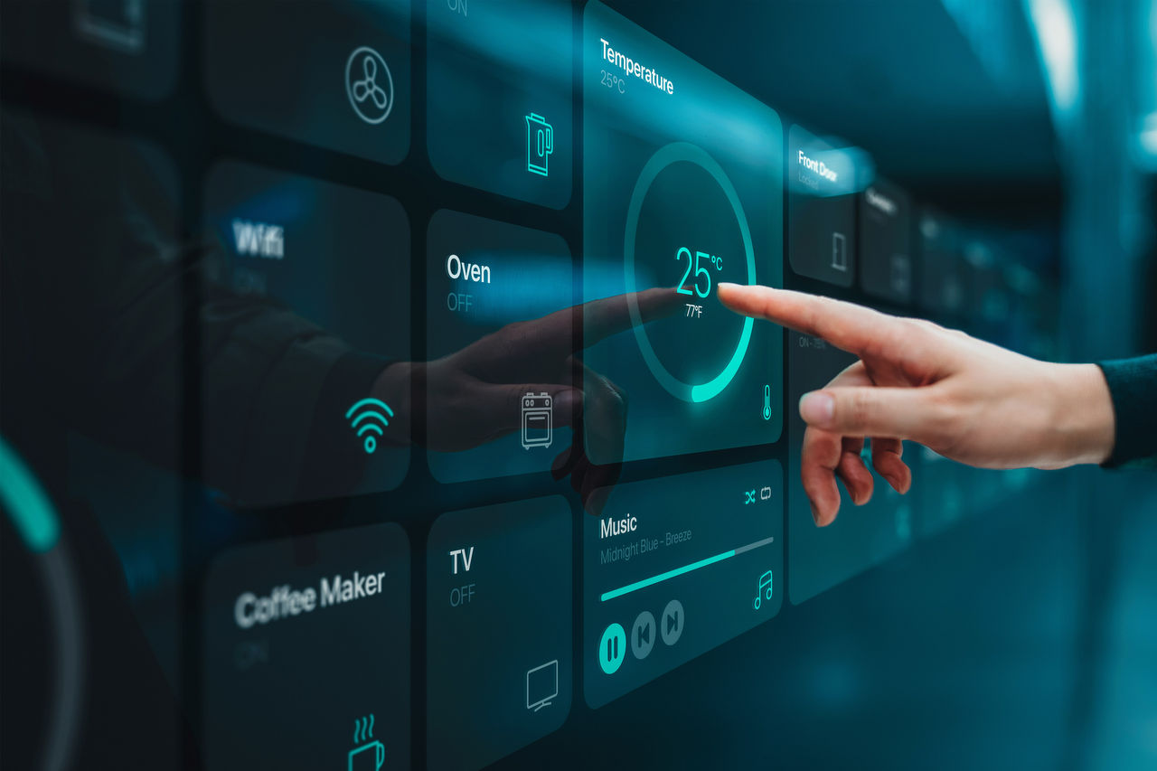 Close up of woman's hand setting up intelligent home system