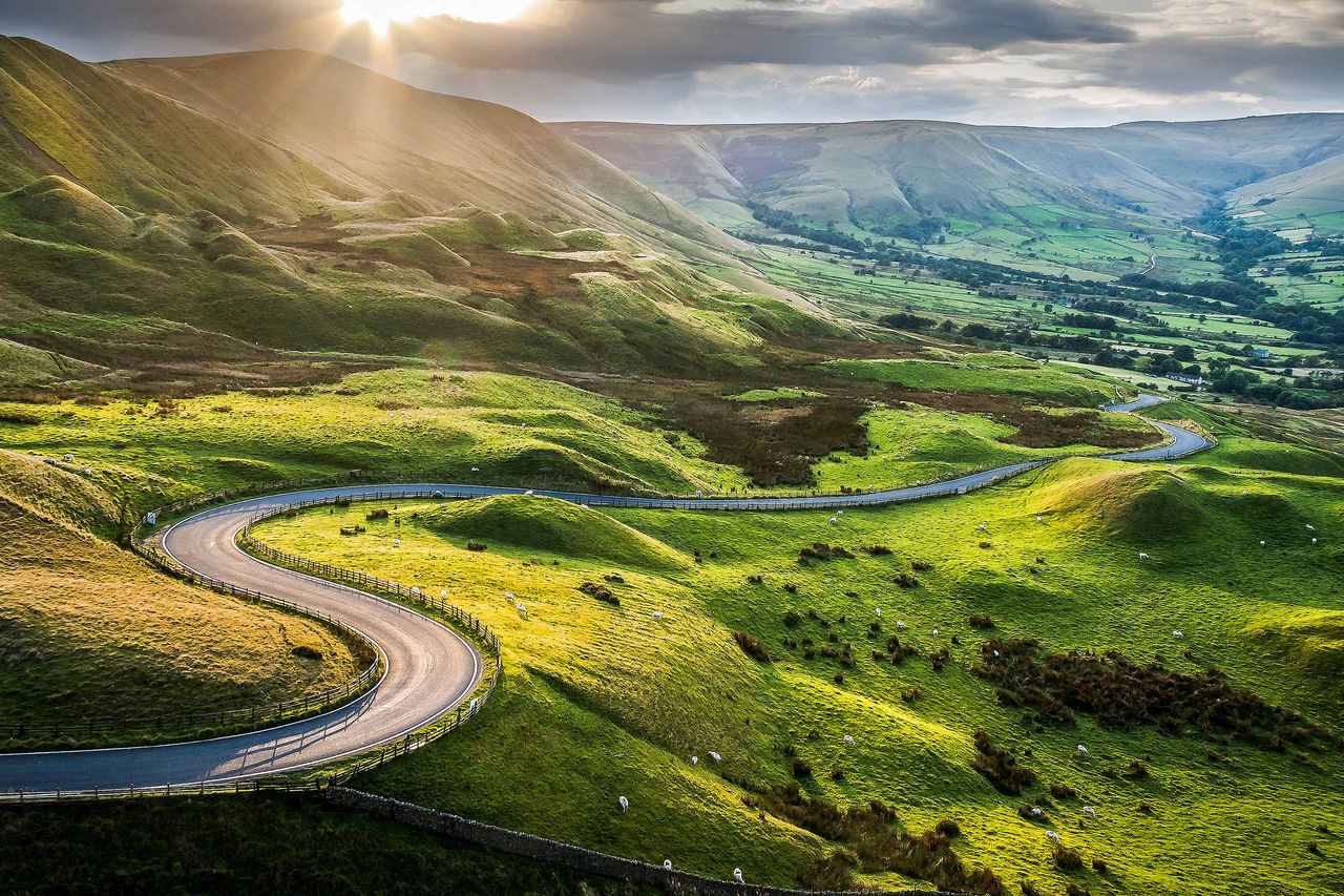The road travel between the mountains